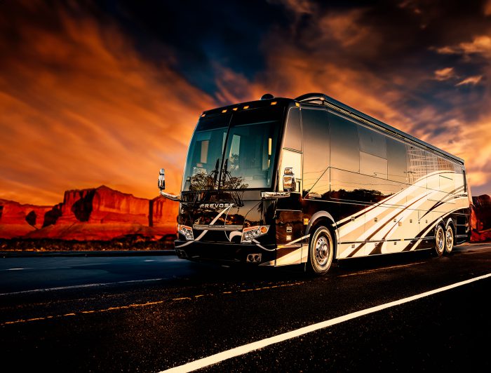 prevost-motorhome-during-sunset-in-desert-background-700x532